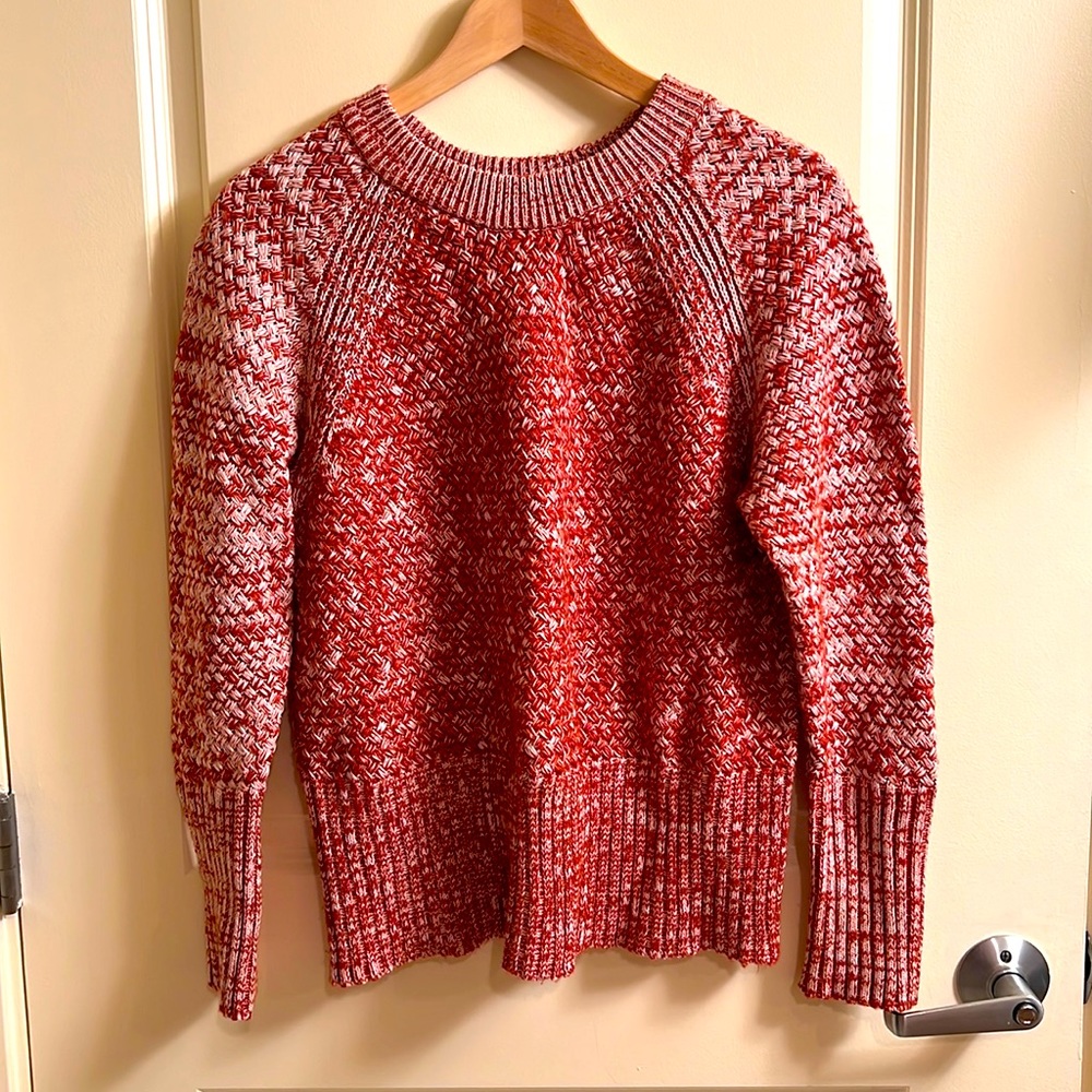 Rust red crew neck sweater.